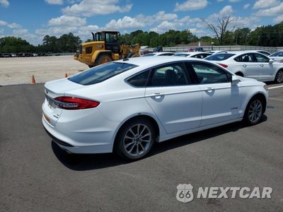 Trzecie zdjęcie samochodu z tyłu: 2017 FORD FUSION SE HYBRID VIN:3FA6P0LU9HR409250 - miniatura