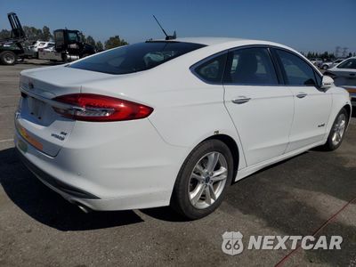 Trzecie zdjęcie samochodu z tyłu: 2018 FORD FUSION SE HYBRID VIN:3FA6P0LU2JR278734 - miniatura