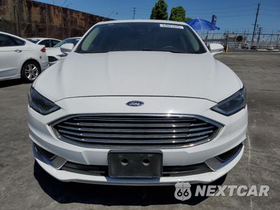 Piąte zdjęcie samochodu w środku: 2018 FORD FUSION SE HYBRID VIN:3FA6P0LU3JR172132 - miniatura