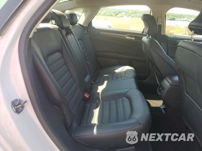Zdjęcie 10 z 13 samochodu: 2018 FORD FUSION SE HYBRID VIN:3FA6P0LU2JR171795 - miniatura