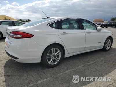 Trzecie zdjęcie samochodu z tyłu: 2018 FORD FUSION SE HYBRID VIN:3FA6P0LU1JR172145 - miniatura