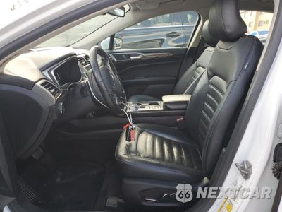 Zdjęcie 7 z 12 samochodu: 2017 FORD FUSION SE HYBRID VIN:3FA6P0LU6HR359679 - miniatura