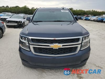 Piąte zdjęcie samochodu w środku: 2019 CHEVROLET TAHOE C1500 LT VIN:1GNSCBKC5KR218864 - miniatura