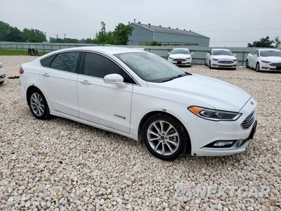 Czwarte zdjęcie samochodu z boku: 2017 FORD FUSION SE HYBRID VIN:3FA6P0LU3HR409048 - miniatura