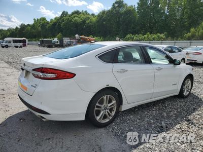 Trzecie zdjęcie samochodu z tyłu: 2018 FORD FUSION SE HYBRID VIN:3FA6P0LU6JR281913 - miniatura