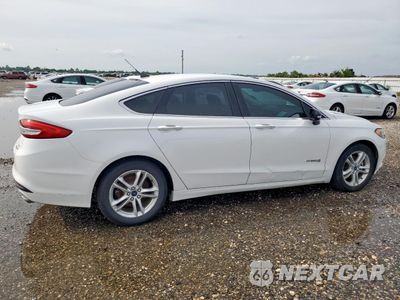 Trzecie zdjęcie samochodu z tyłu: 2018 FORD FUSION SE HYBRID VIN:3FA6P0LU3JR171742 - miniatura