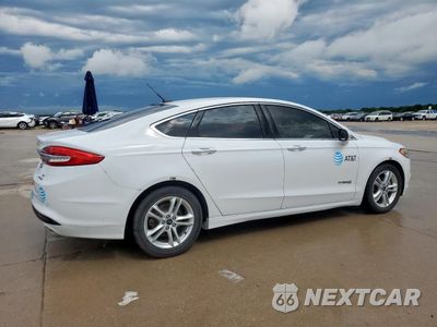 Trzecie zdjęcie samochodu z tyłu: 2018 FORD FUSION SE HYBRID VIN:3FA6P0LU5JR118654 - miniatura