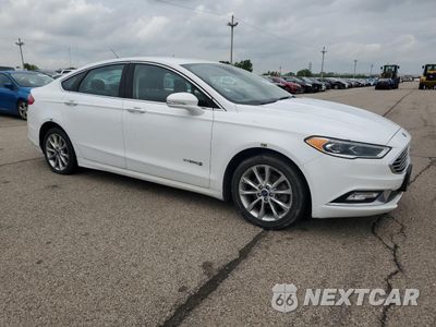 Czwarte zdjęcie samochodu z boku: 2017 FORD FUSION SE HYBRID VIN:3FA6P0LU3HR409146 - miniatura