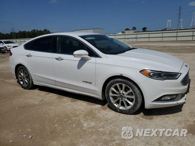 Czwarte zdjęcie samochodu z boku: 2017 FORD FUSION SE HYBRID VIN:3FA6P0LU4HR409107 - miniatura