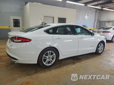 Trzecie zdjęcie samochodu z tyłu: 2018 FORD FUSION SE HYBRID VIN:3FA6P0LUXJR278674 - miniatura