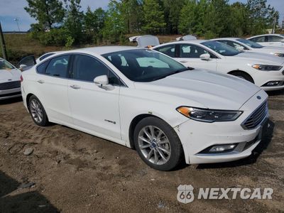 Czwarte zdjęcie samochodu z boku: 2017 FORD FUSION SE HYBRID VIN:3FA6P0LU8HR359618 - miniatura