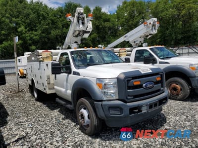 Czwarte zdjęcie samochodu z boku: 2015 FORD F450 SUPER DUTY VIN:1FDUF4GY1FEA90091 - miniatura