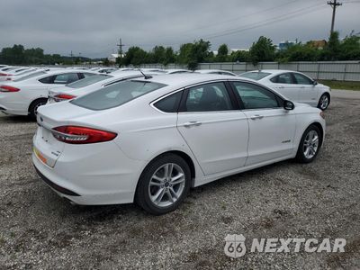 Trzecie zdjęcie samochodu z tyłu: 2018 FORD FUSION SE HYBRID VIN:3FA6P0LU0JR171875 - miniatura