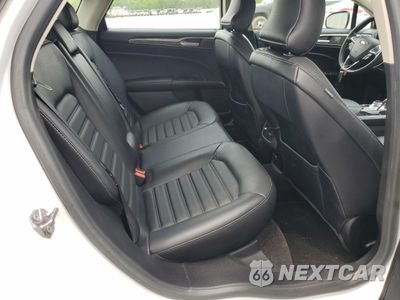 Zdjęcie 10 z 12 samochodu: 2017 FORD FUSION SE HYBRID VIN:3FA6P0LU9HR409250 - miniatura