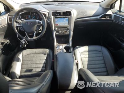 Zdjęcie 8 z 12 samochodu: 2017 FORD FUSION SE HYBRID VIN:3FA6P0LU0HR409699 - miniatura