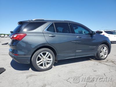 Trzecie zdjęcie samochodu z tyłu: 2018 CHEVROLET EQUINOX PREMIER VIN:2GNAXMEV6J6100311 - miniatura