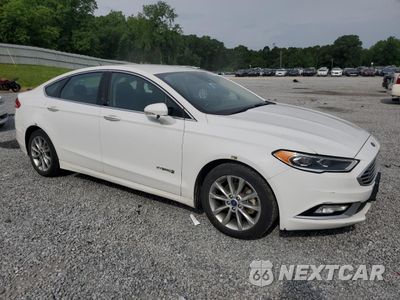 Czwarte zdjęcie samochodu z boku: 2017 FORD FUSION SE HYBRID VIN:3FA6P0LU3HR409213 - miniatura
