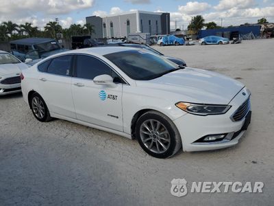 Czwarte zdjęcie samochodu z boku: 2017 FORD FUSION SE HYBRID VIN:3FA6P0LU9HR359563 - miniatura