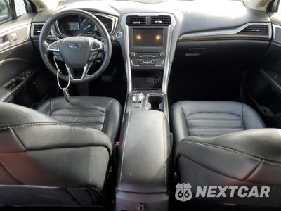 Zdjęcie 8 z 12 samochodu: 2018 FORD FUSION SE HYBRID VIN:3FA6P0LU0JR118609 - miniatura