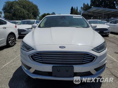 Piąte zdjęcie samochodu w środku: 2018 FORD FUSION SE HYBRID VIN:3FA6P0LU6JR118680 - miniatura