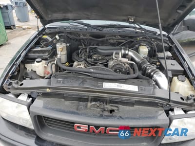 Zdjęcie 11 z 12 samochodu: 2000 GMC JIMMY VIN:1GKCS18W2YK221142 - miniatura