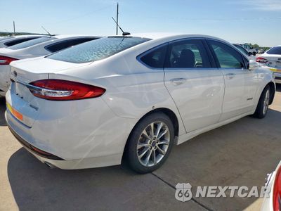 Trzecie zdjęcie samochodu z tyłu: 2017 FORD FUSION SE HYBRID VIN:3FA6P0LU0HR409024 - miniatura