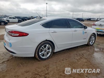 Trzecie zdjęcie samochodu z tyłu: 2018 FORD FUSION SE HYBRID VIN:3FA6P0LU6JR261600 - miniatura