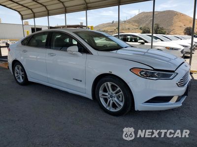 Czwarte zdjęcie samochodu z boku: 2018 FORD FUSION SE HYBRID VIN:3FA6P0LU3JR171711 - miniatura