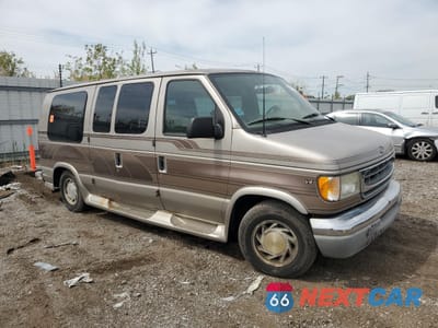 Czwarte zdjęcie samochodu z boku: 2001 FORD ECONOLINE E150 VAN VIN:1FDRE14W41HB03000 - miniatura