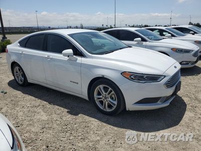 Czwarte zdjęcie samochodu z boku: 2018 FORD FUSION SE HYBRID VIN:3FA6P0LU6JR171573 - miniatura