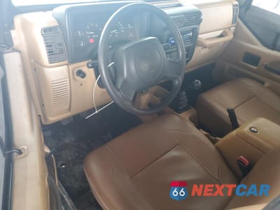 Zdjęcie 8 z 12 samochodu: 1997 JEEP WRANGLER / TJ SE VIN:1J4FY29P4VP457563 - miniatura