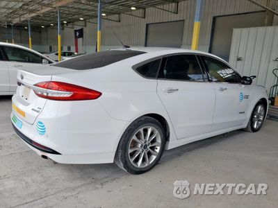Trzecie zdjęcie samochodu z tyłu: 2017 FORD FUSION SE HYBRID VIN:3FA6P0LU2HR408974 - miniatura