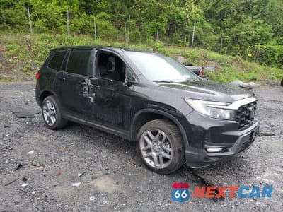 Czwarte zdjęcie samochodu z boku: 2023 HONDA PASSPORT EXL VIN:5FNYF8H55PB022183 - miniatura