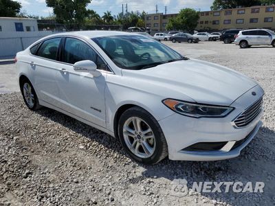 Czwarte zdjęcie samochodu z boku: 2018 FORD FUSION SE HYBRID VIN:3FA6P0LUXJR278707 - miniatura