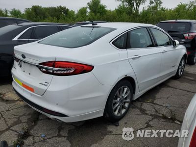 Trzecie zdjęcie samochodu z tyłu: 2017 FORD FUSION SE HYBRID VIN:3FA6P0LU2HR359548 - miniatura