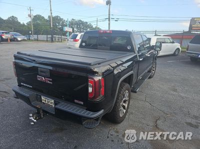 Czwarte zdjęcie samochodu z boku: 2016 GMC SIERRA K1500 SLT VIN:3GTU2NEJ0GG220769 - miniatura