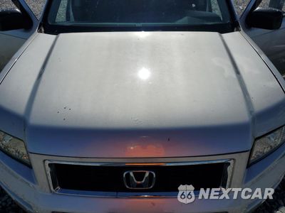 Zdjęcie 11 z 14 samochodu: 2007 HONDA RIDGELINE RTX VIN:2HJYK16317H501503 - miniatura