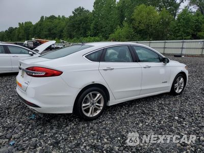 Trzecie zdjęcie samochodu z tyłu: 2018 FORD FUSION SE HYBRID VIN:3FA6P0LU4JR281912 - miniatura