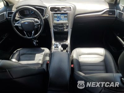 Zdjęcie 8 z 13 samochodu: 2017 FORD FUSION SE HYBRID VIN:3FA6P0LU4HR409205 - miniatura