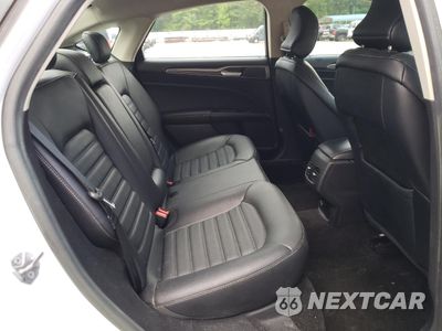 Zdjęcie 10 z 12 samochodu: 2018 FORD FUSION SE HYBRID VIN:3FA6P0LU5JR171760 - miniatura