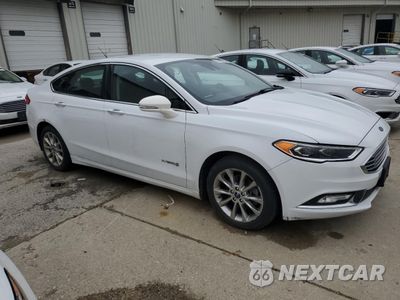 Czwarte zdjęcie samochodu z boku: 2017 FORD FUSION SE HYBRID VIN:3FA6P0LU1HR359685 - miniatura