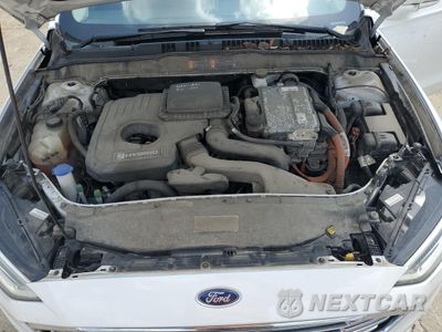 Zdjęcie 11 z 12 samochodu: 2017 FORD FUSION SE HYBRID VIN:3FA6P0LU6HR359648 - miniatura