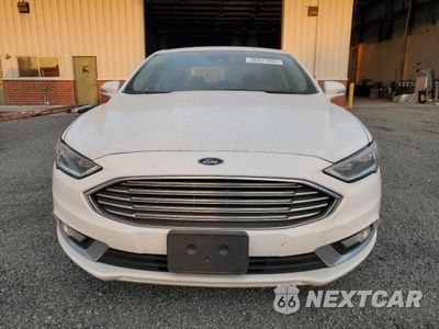 Piąte zdjęcie samochodu w środku: 2017 FORD FUSION SE HYBRID VIN:3FA6P0LUXHR409578 - miniatura