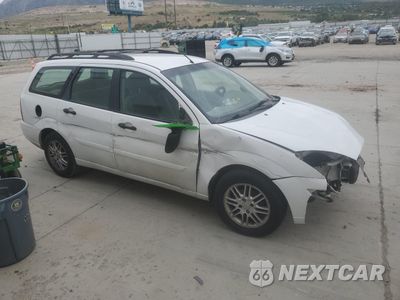 Czwarte zdjęcie samochodu z boku: 2003 FORD FOCUS SE VIN:1FAFP36333W242345 - miniatura