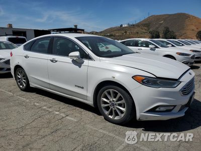 Czwarte zdjęcie samochodu z boku: 2017 FORD FUSION SE HYBRID VIN:3FA6P0LU4HR409737 - miniatura