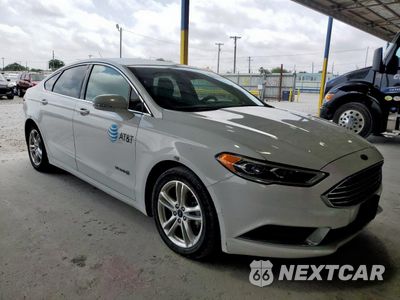 Czwarte zdjęcie samochodu z boku: 2018 FORD FUSION SE HYBRID VIN:3FA6P0LU2JR171635 - miniatura