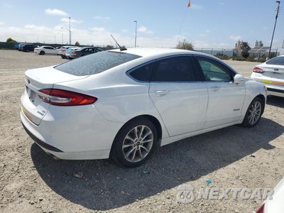 Trzecie zdjęcie samochodu z tyłu: 2017 FORD FUSION SE HYBRID VIN:3FA6P0LU0HR409699 - miniatura