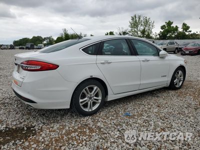 Trzecie zdjęcie samochodu z tyłu: 2018 FORD FUSION SE HYBRID VIN:3FA6P0LU5JR171855 - miniatura