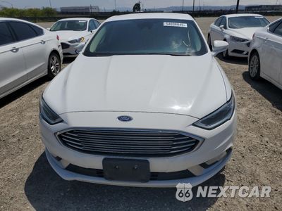 Piąte zdjęcie samochodu w środku: 2017 FORD FUSION SE HYBRID VIN:3FA6P0LU7HR409702 - miniatura