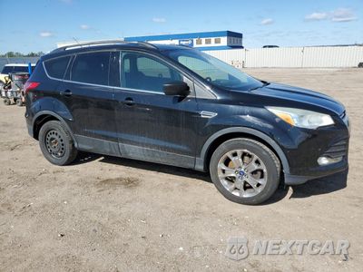 Czwarte zdjęcie samochodu z boku: 2014 FORD ESCAPE SE VIN:1FMCU0G93EUE33829 - miniatura